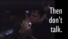Truman Burbank kisses Sylvia, whose name he still thinks is Lauren