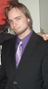 Alex Peak dressed as a politician